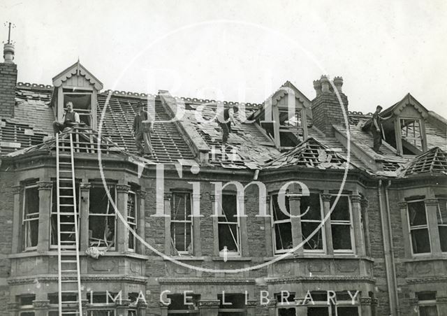 Roofers set about replacing roof tiles, Oldfield Park, Bath 1942