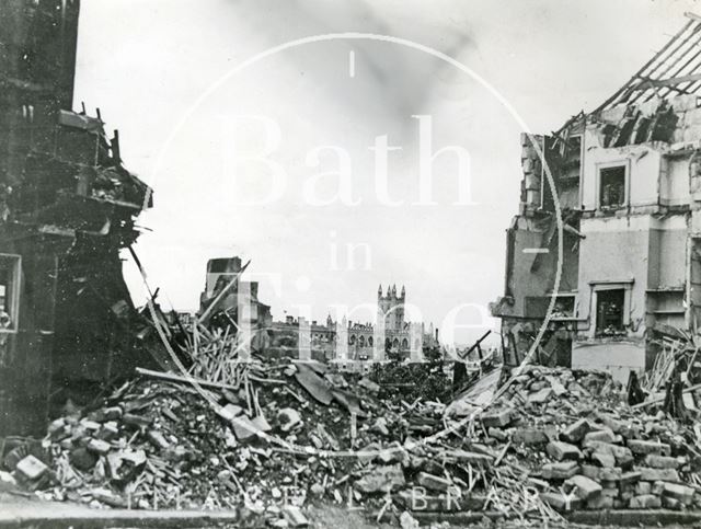 Bath Abbey seen through the bomb damaged ruins of 36 to 40, Wells Road 1942