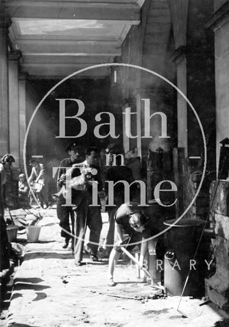 Clearing up at the Roman Baths after the Bath Blitz 1942