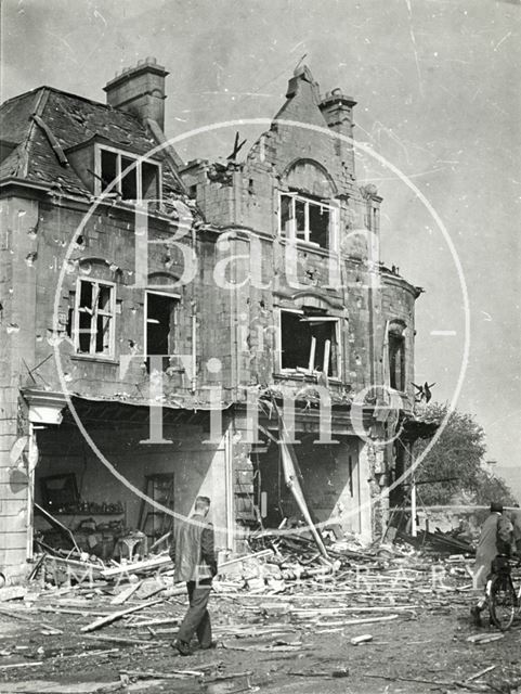 Walking past the devastation at 2 to 6, Wellsway, Bath 1942