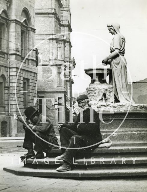 Taking a break at Rebekah Fountain, High Street, Bath c.1920