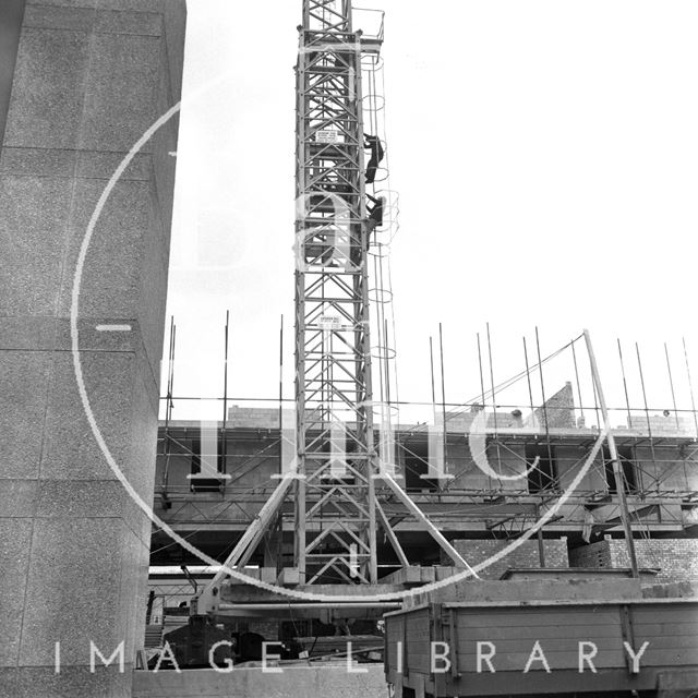 Lord Snowdon and Adam Fergusson climbing the tower crane at the site of the Beaufort (Hilton) Hotel, Bath 1972