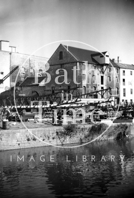 Temporary bridge over the Avon, with Broad Quay in the background, Bath c.1964