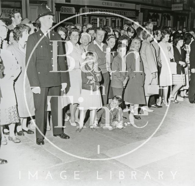 Crowds waiting for Princess Margaret and Lord Snowdon in the High Street, Bath 1962