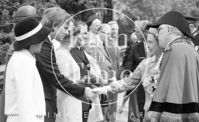 Mayor Raymond Charles Rosewarn guides the Queen down a line up during her visit to Bath 1977