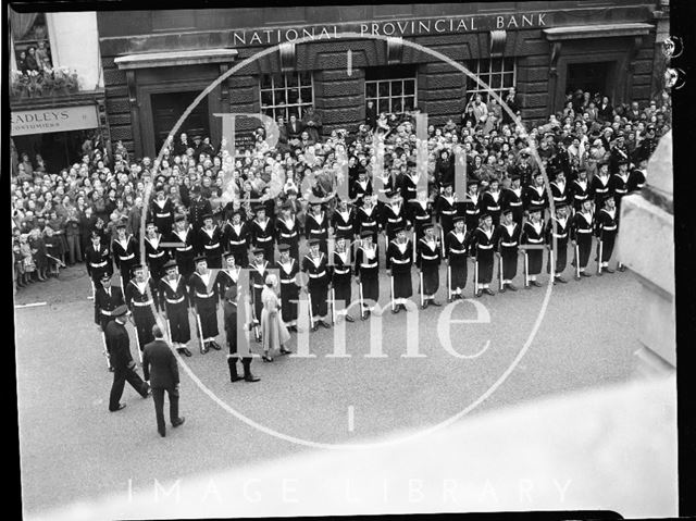 The Queen inspecting the parade of sailors outside the Guildhall, Bath 1956