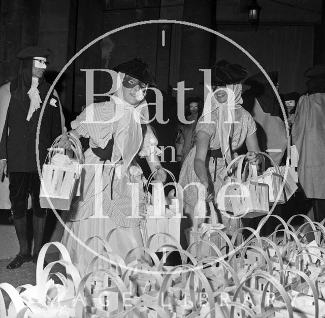 Goody bags are prepared for the visitors under Grand Parade, Bath 1962