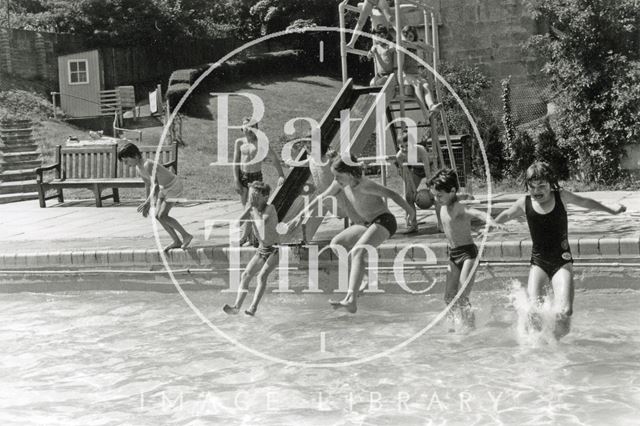 Children making the most of the weekend sunshine at Cleveland Baths, Bath 1978