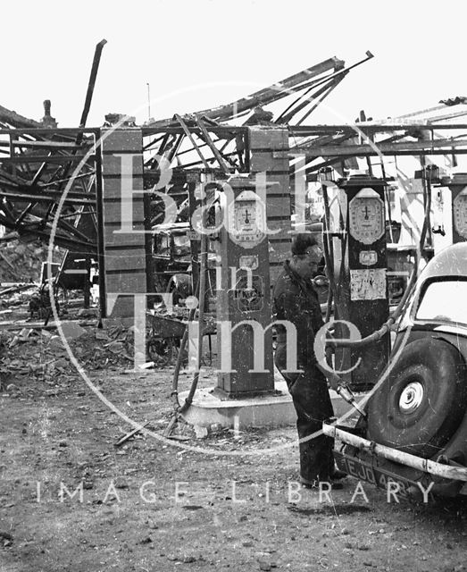 Filling up outside Hilltop Motors, Wellsway, Bath 1942