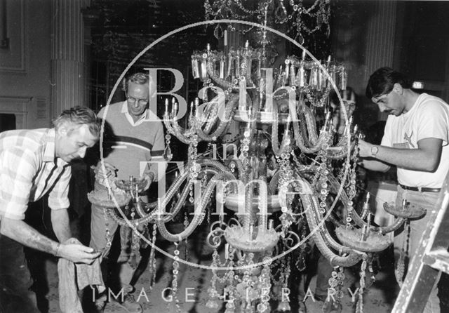 Cleaning the chandelier in the Pump Room, Bath 1989