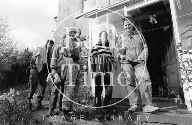 Protesters queuing up for a wash outside Bay tree Cottage, a condemned house in Swainswick 1994