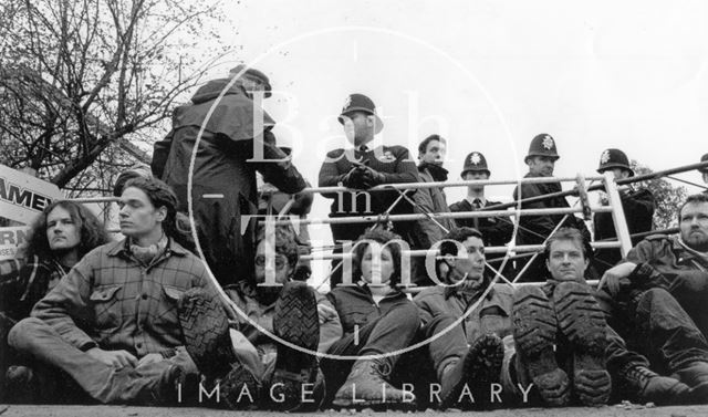 Protesters block a gateway, watched by the police, Batheaston/Swainswick Bypass 1994