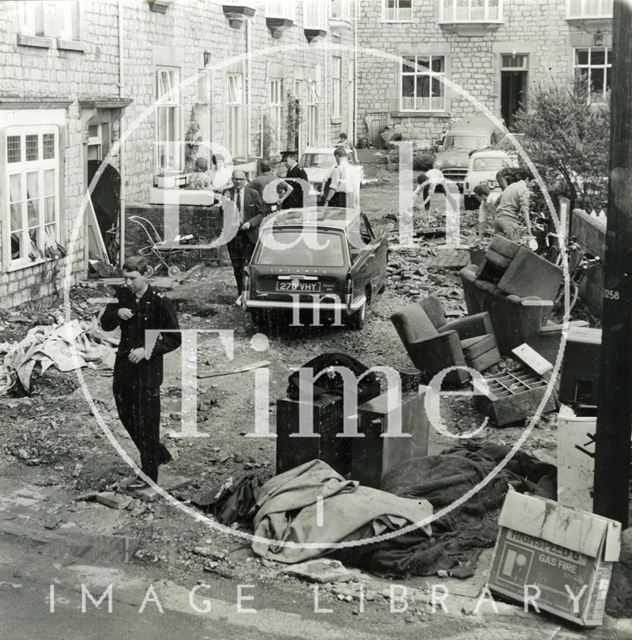 Clearing up after the floods at Montrose Cottages, Weston, Bath 1968