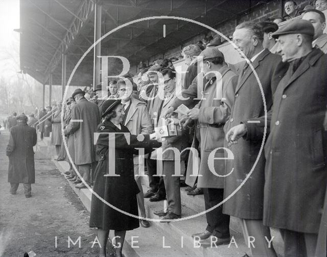 St Johns Ambulance volunteers make a collection from spectators at Bath's Recreation Ground, early 1960s.