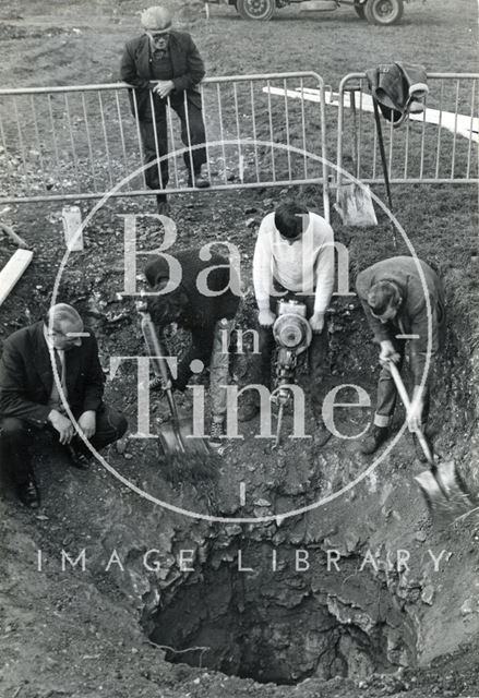 Investigating a mysterious hole, The Firs, Combe Down, Bath c.1960