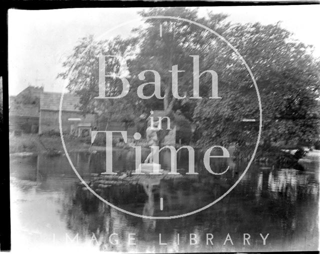 The lake and statue in the grounds of an unknown house, c.1930s