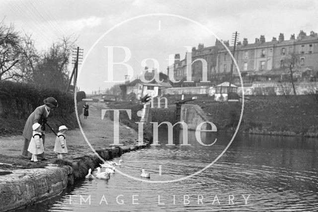 Feeding the ducks, Sydney Buildings c.1915 - detail