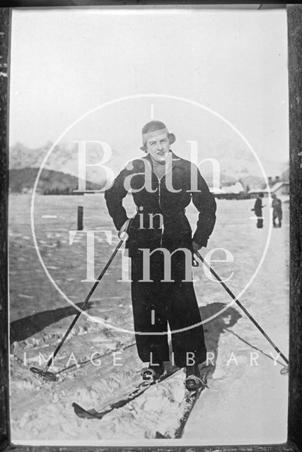 A lady posing with skis c.1920