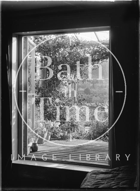 Looking through the window of No. 32, Sydney Buildings, Bath c.1920