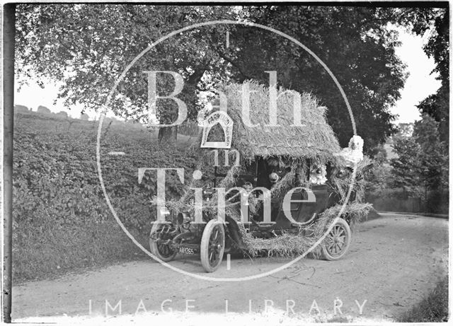 Car decorated with Monkton House Farmyard comes to Horseshoe Walk?, Bath c.1920