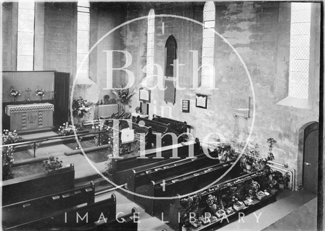 Interior of the chapel at St. Martin's Hospital, possibly decorated for harvest?, Bath c.1920