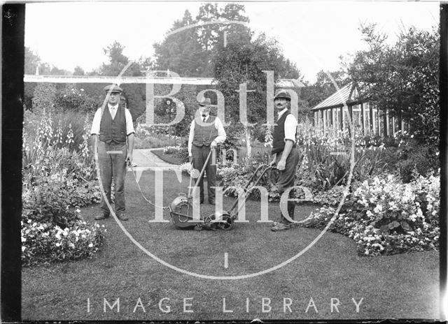 Three gardeners in the back garden of an unidentified house c.1910