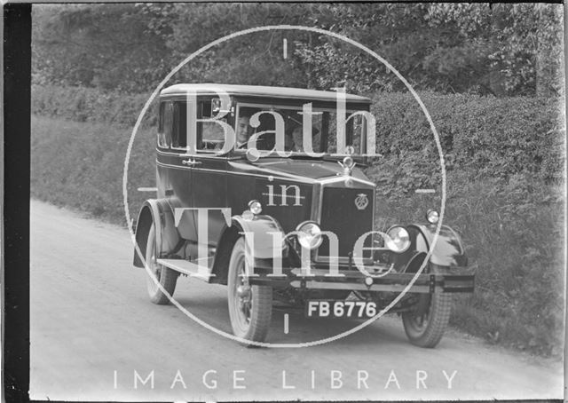 The photographer's wife and son in his car c.1929