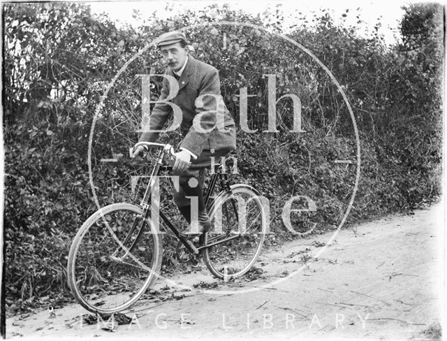 Self-Portrait on bicycle at Dry Arch, Warminster Road, Bathampton c.1905