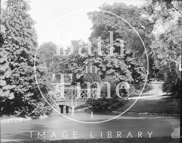 Rustic bridge and ornamental lake in Royal Victoria Park, Bath c.1905