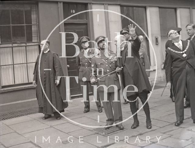 Haile Selassie is shown the tower of Bath Abbey by the Archdeacon Venerable E.A. Cook 1954