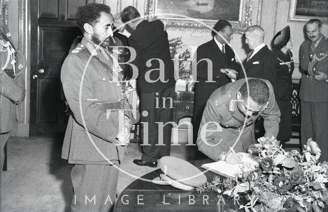 Haile Selassie's son Prince Makonnen, Duke of Harar signs the visitor's book in Bath 1954