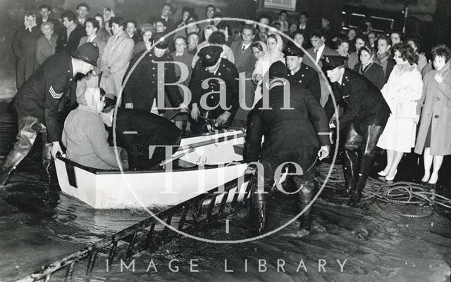 Rescuing stranded Bathonians from the Forum, Southgate, Bath 1960