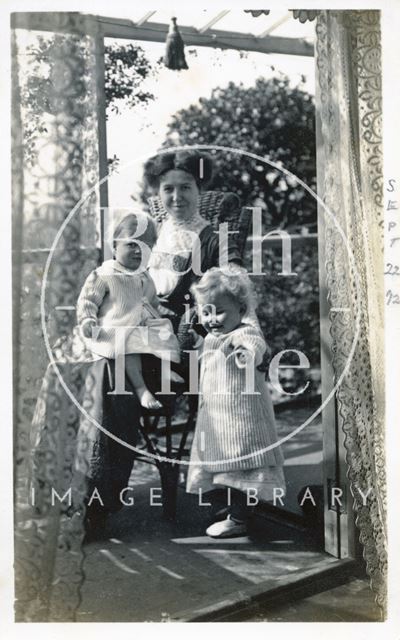 On the balcony of 32, Sydney Gardens, Bath the photographer's wife Violet and twin boys 1912