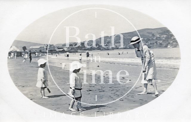 The photographer's wife Violet and twin boys on the beach at Minehead, Somerset c.1914