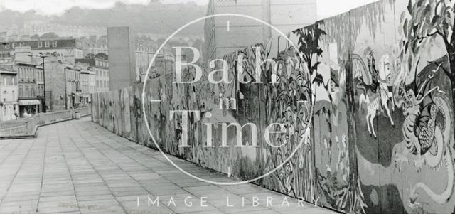 The painted hoarding surrounding the Podium site, next to the Beaufort (Hilton) Hotel, Bath 1984