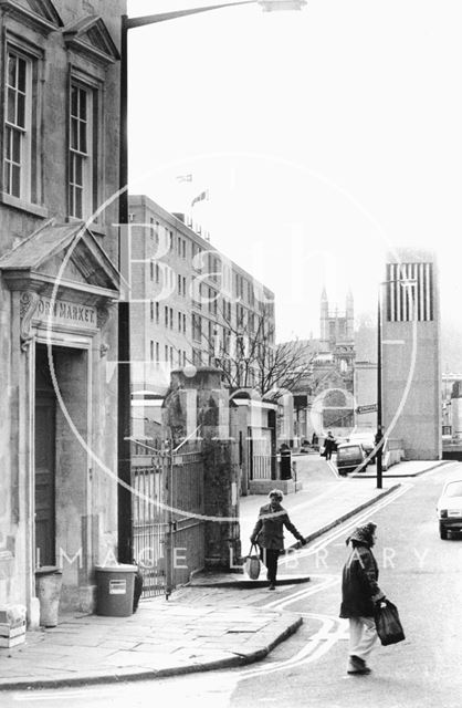 The entrance to the Corn Market, with the Beaufort Hotel and ventilation shaft in the background, Walcot Street, Bath 1983