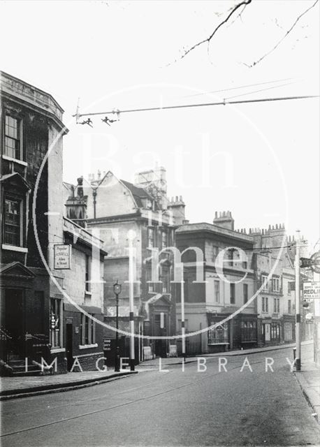 Walcot Street showing the Beehive, entrance to the Tramshed and the Corn Market, Bath 1936