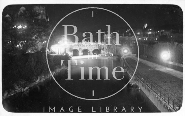 View of Pulteney Bridge from North Parade bridge at night, Bath c.1930