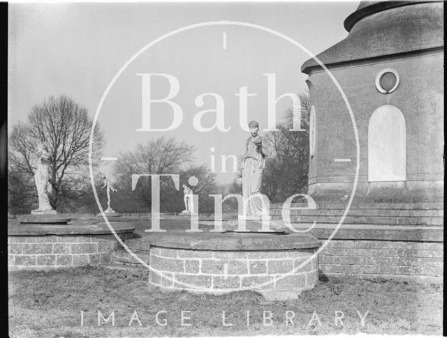 Statues at the base of the column, Ammerdown Park, Kilmersdon, Somerset c.1938