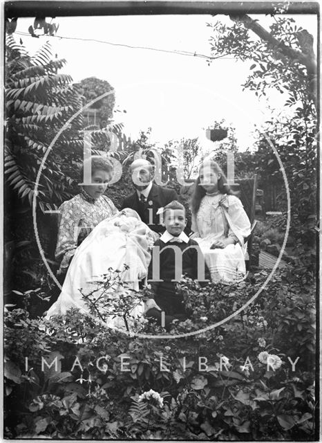 An unidentified group of people and baby c.1910