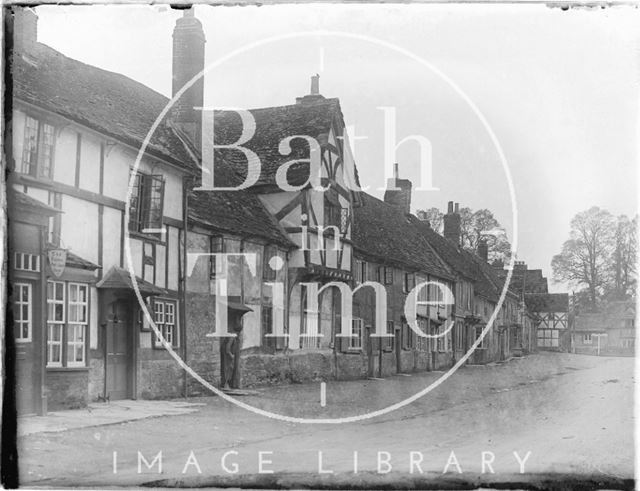 A row of timber framed houses in Lacock, Wiltshire 1926