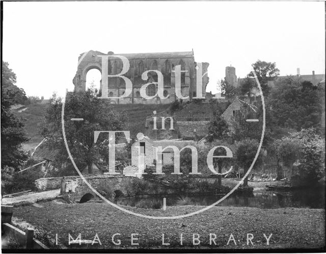 Malmesbury Abbey, Wiltshire, viewed from the river behind c.1935