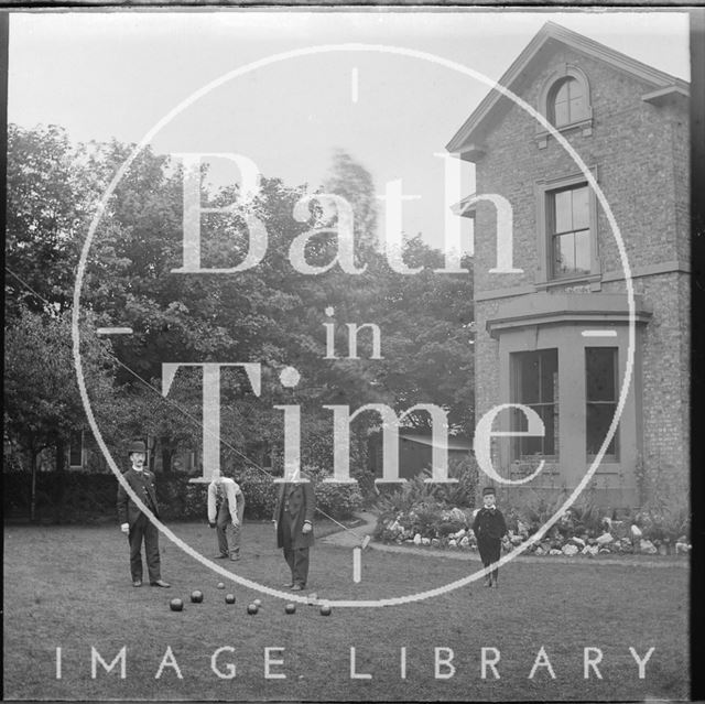 Lawn bowls in an unidentified back garden c.1900