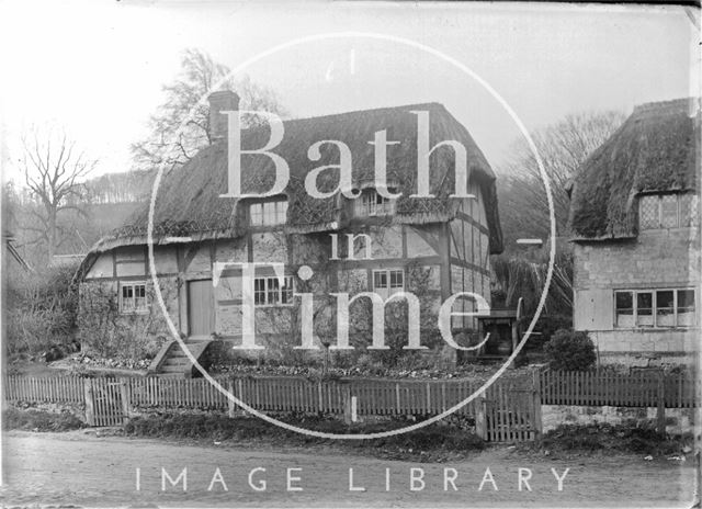 An unidentified timber-framed, thatched cottage, Keevil, Wiltshire c.1930