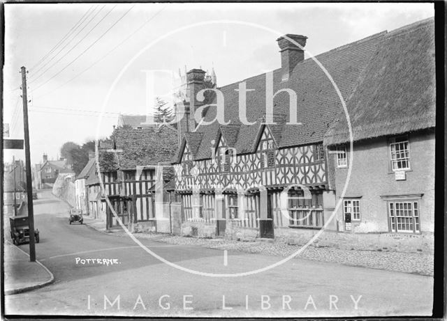 Timber-framed buildings in the High Street, Potterne, Wiltshire 1935