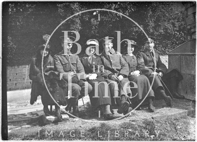 Members of 12th Hants posing with some women, Bath 1915