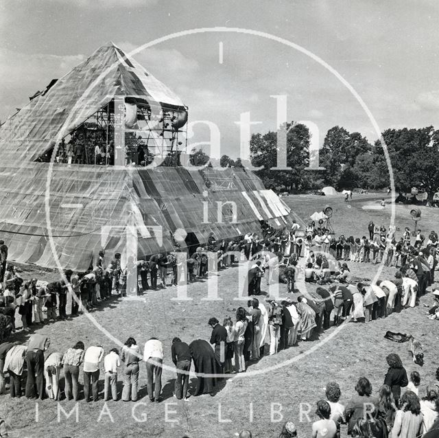 A gathering in front of the Pyramid Stage at the Glastonbury Free Festival, Pilton, Somerset 1971