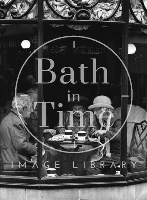 Three elderly women having tea c.1980