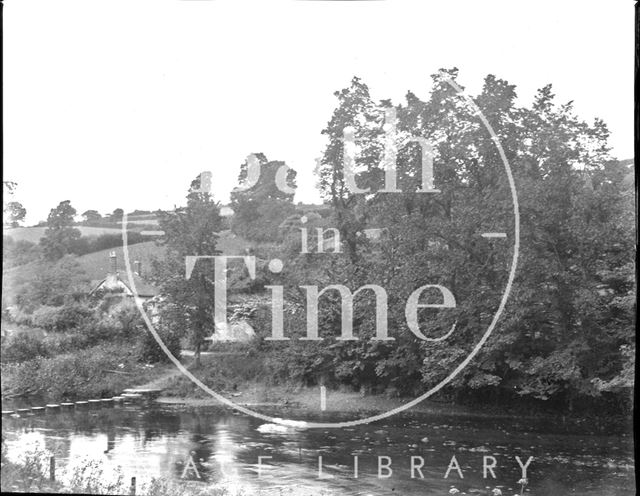 Cottage near stepping stones at an unidentified location c.1900