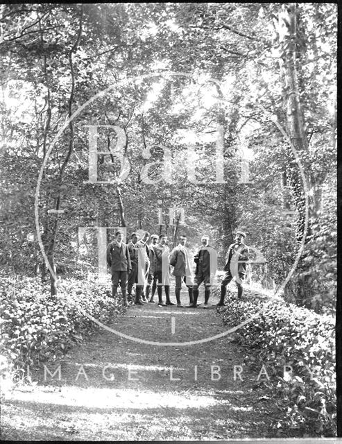 Group of gents in cycling attire stopping for a smoke c.1900